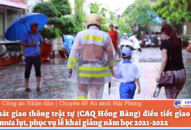 Cảnh sát giao thông trật tự (CAQ Hồng Bàng) điều tiết giao thông trong mưa lụt, phục vụ lễ khai giảng năm học 2021-2022