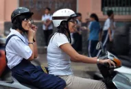 Tập trung xử lý đối với lỗi vi phạm không đội mũ bảo hiểm, nhất là trẻ em khi tham gia giao thông bằng xe mô tô, xe gắn máy, xe đạp điện